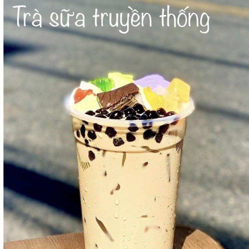 tra-sua-kem-trung-dua-nuong-full-topping