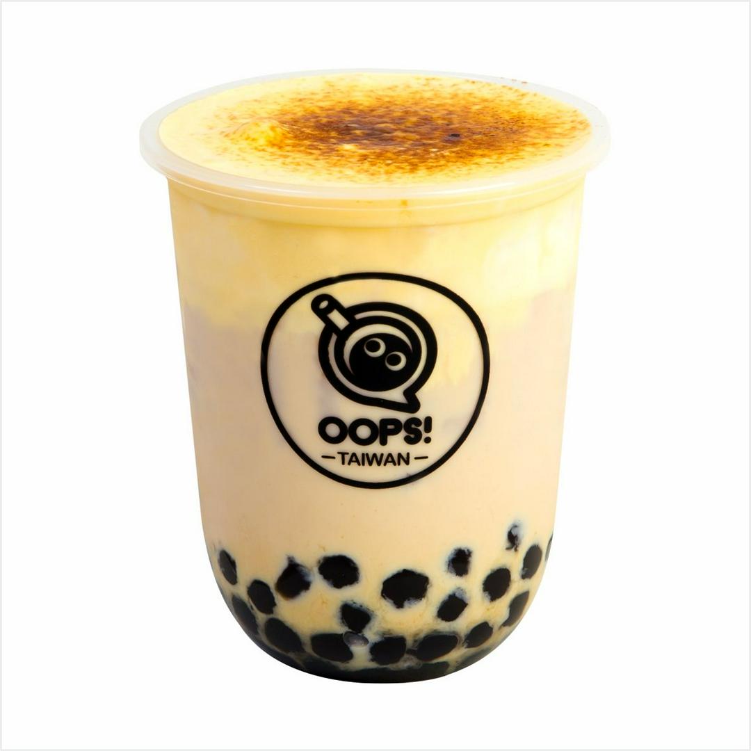 tra-sua-tran-chau-uong-en-kem-trung-chay