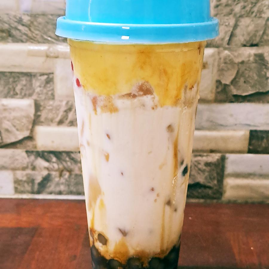 sua-tuoi-tran-chau-uong-en-kem-trung-dua-nuong-ai-loan