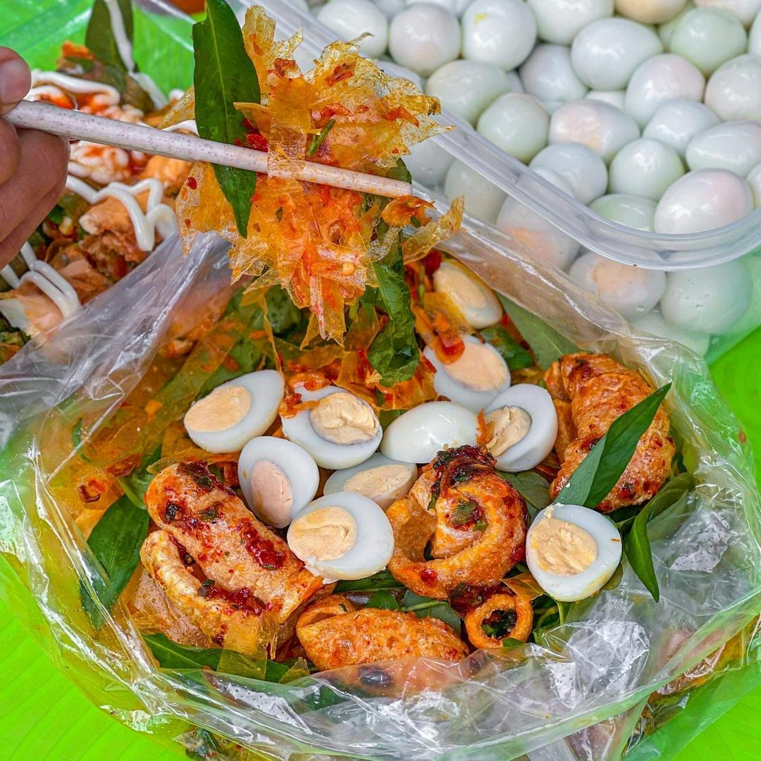 banh-trang-tron-kho-muc-top-mo-da-heo