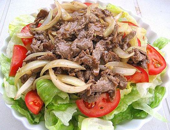 com-bo-xao-cu-hanh-tay