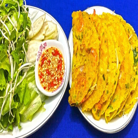 banh-xeo-co-loan-an-la-ghien-rach-bung-binh