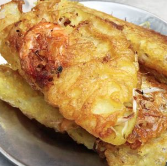 co-nhan-banh-xeo-rau-rung-giai-phong