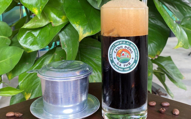 canh-ong-ca-phe-uong-so-63