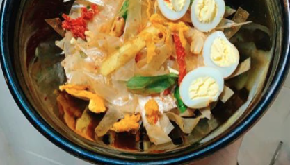 banh-trang-tron-an-vat-huynh-tan-phat